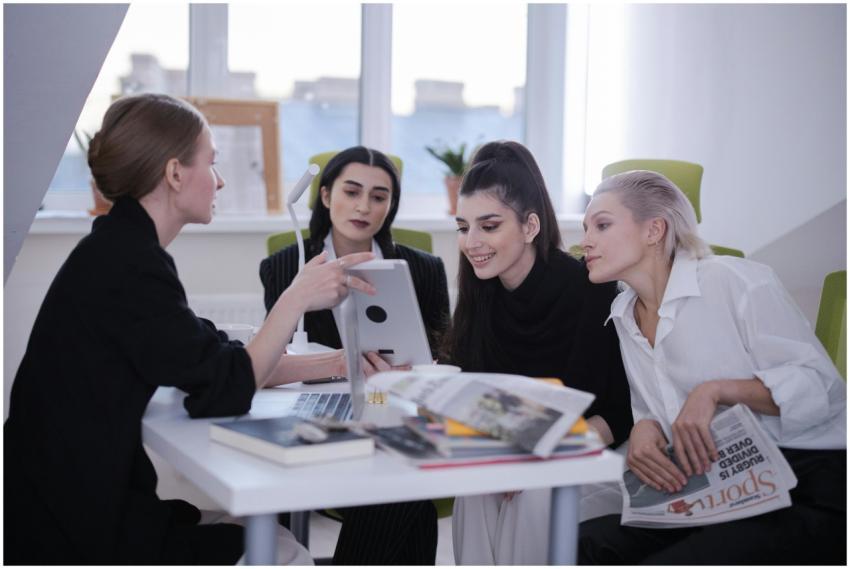 Four women engage in a creative brainstorming sess