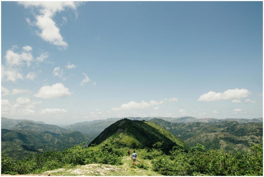 Scenic view of mountains with lush greenery under