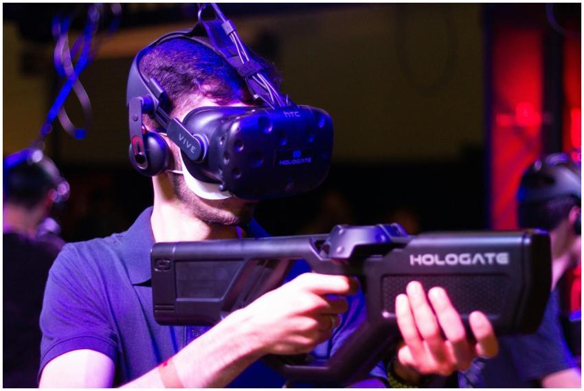 An adult male immerses in a virtual reality game u