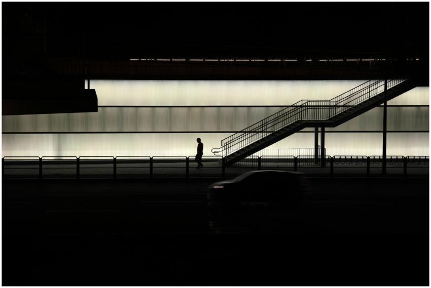 Nighttime scene in Seoul featuring a silhouette of