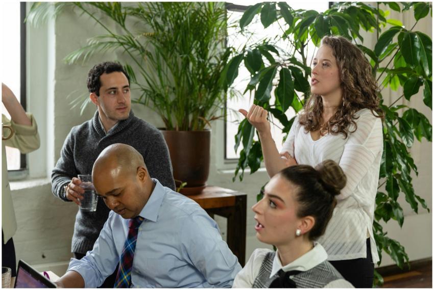 A diverse group of professionals engaging in an of