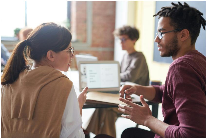 A diverse group of professionals engaged in a coll