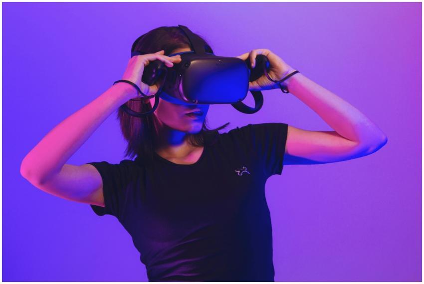 Woman wearing virtual reality headset immersed in