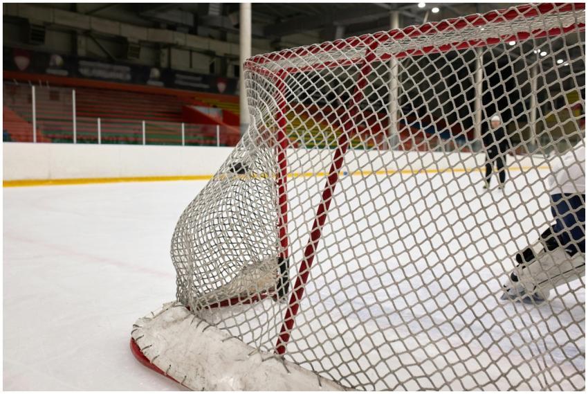 Close-up of a hockey goal on an indoor rink with p