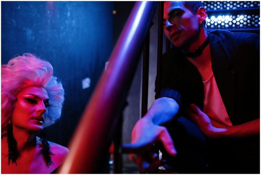 Intimate nightclub encounter showcasing a glamorou