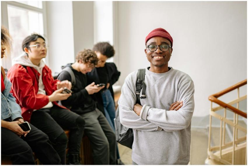 A diverse group of university students indoors, fe