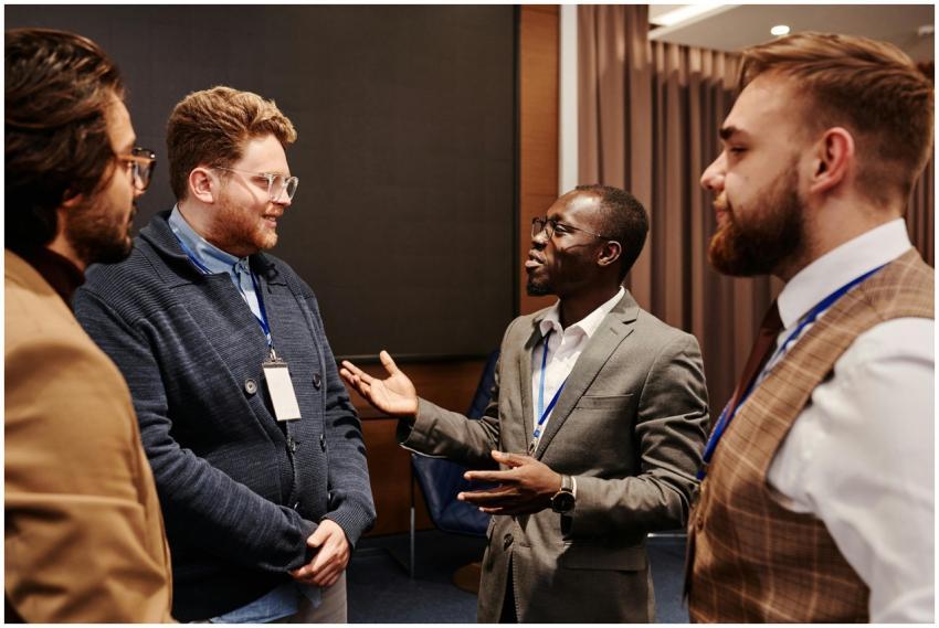 Group of diverse business professionals engaged in