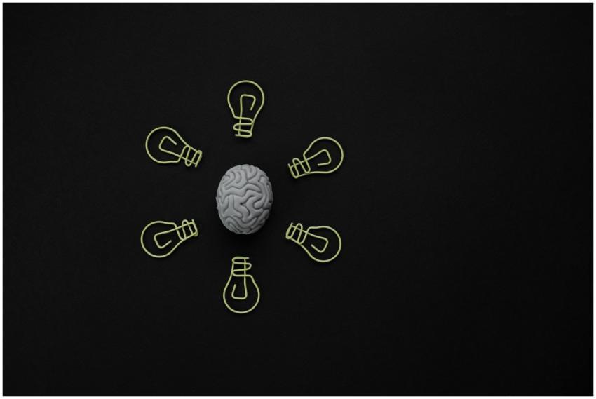 Conceptual photo of a brain surrounded by light bu