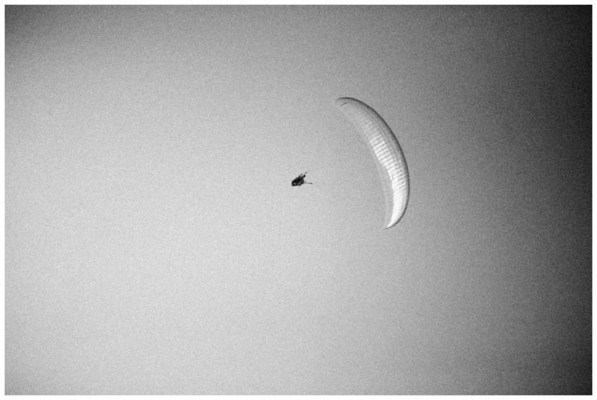 A dramatic black and white photo capturing a parag