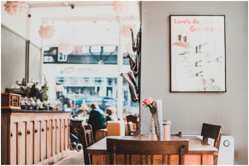 A charming café interior showcasing wooden furnitu