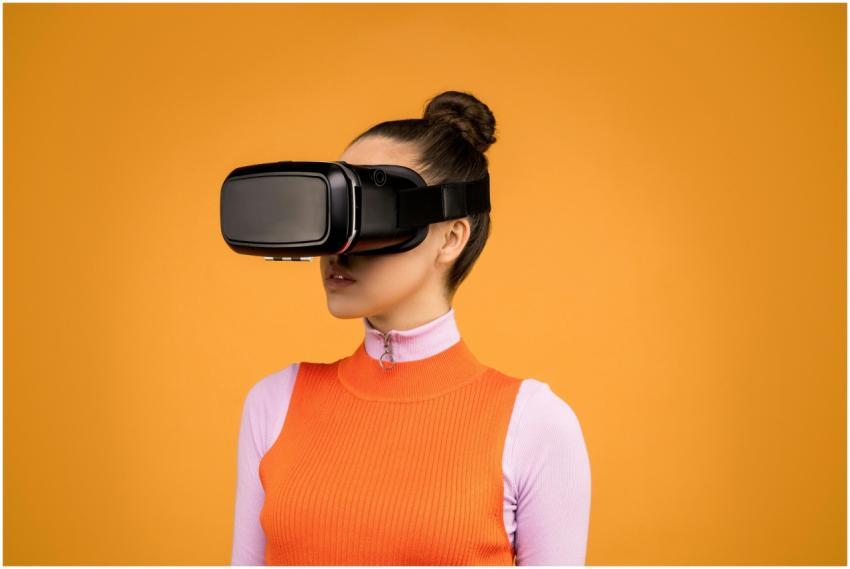 A woman enjoying virtual reality immersion with a