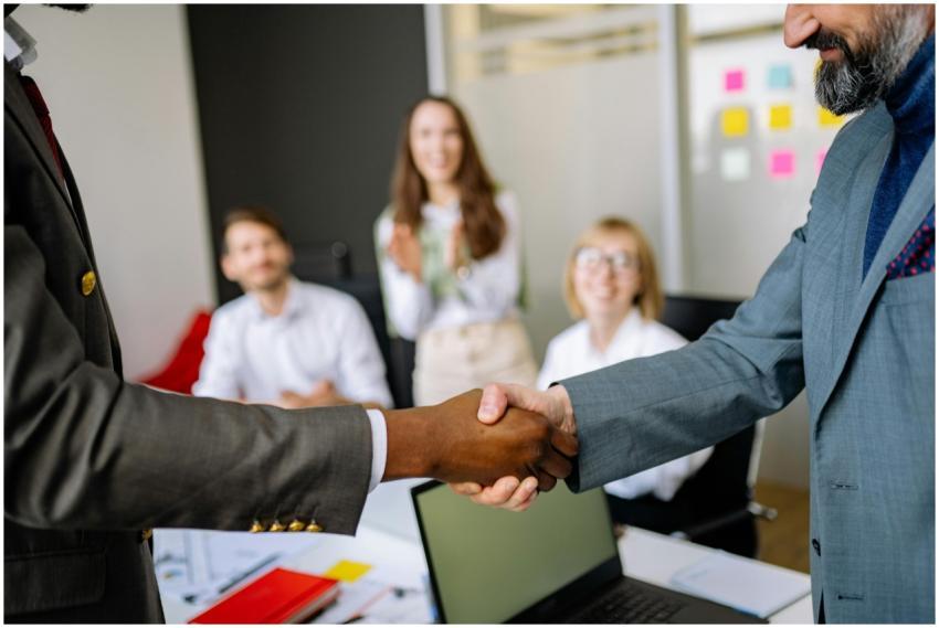 Close-up of a handshake between colleagues in a pr