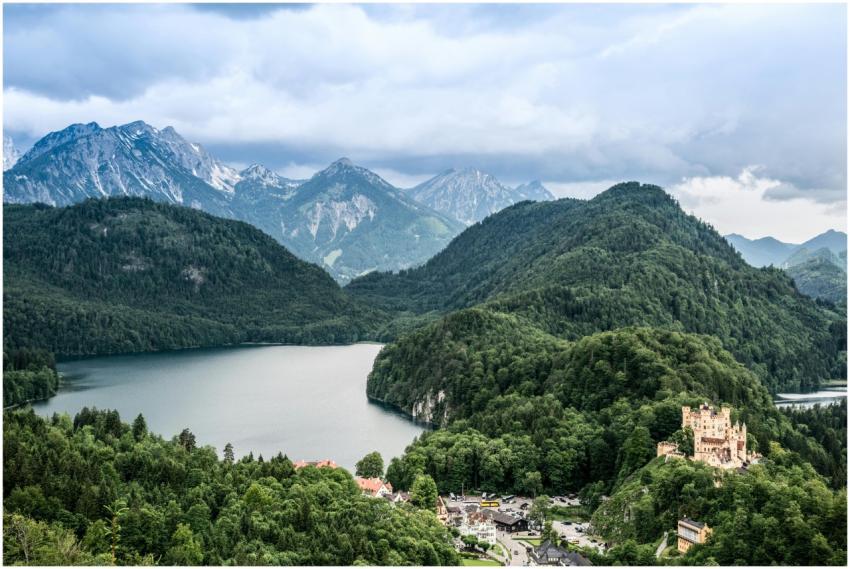 Scenic aerial view of Hohenschwangau Castle surrou