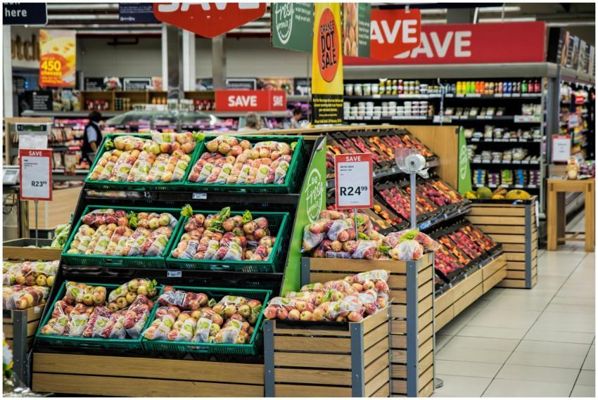 Colorful produce aisle in a supermarket showcasing