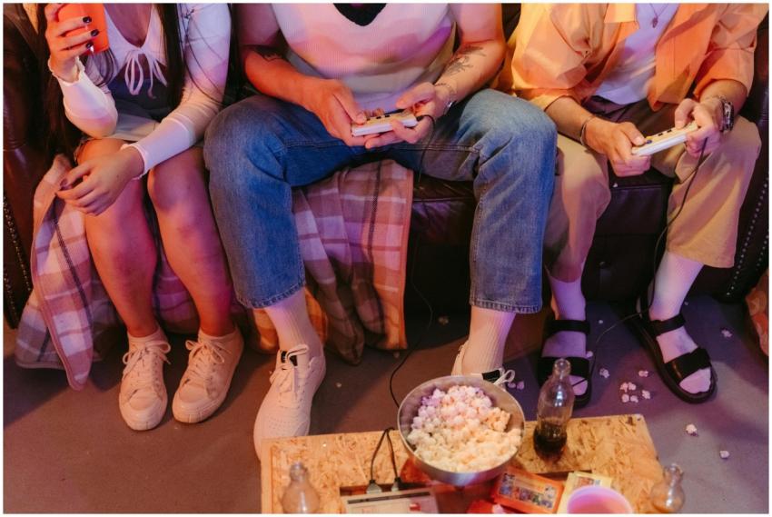 A group of teenagers enjoying a vintage gaming ses