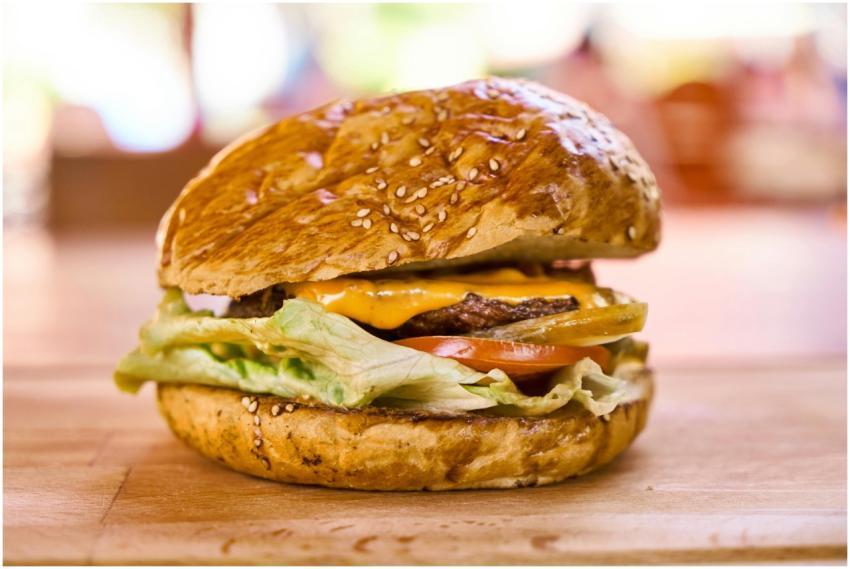 Close-up of a delicious cheeseburger with lettuce