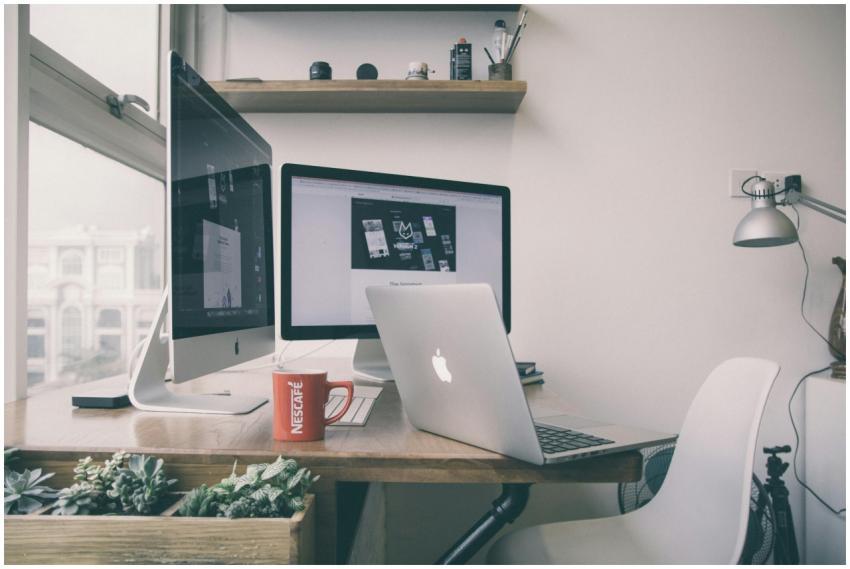 Sleek home office setup with dual monitors, a lapt