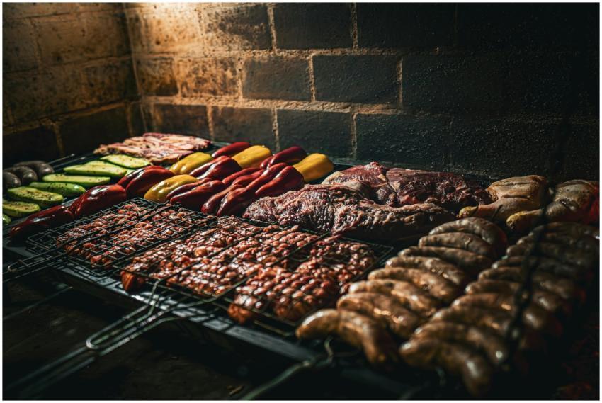 Close-up of assorted meats and vegetables grilling