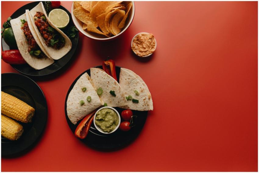 Top view of a delicious Mexican feast featuring ta