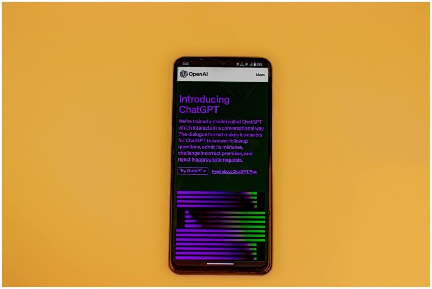 Smartphone displaying ChatGPT interface on a vibra