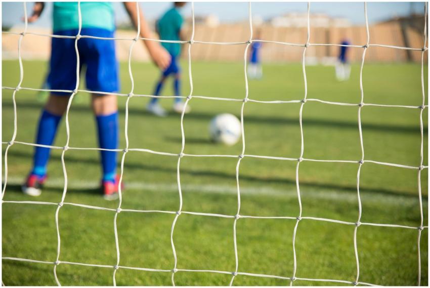 Capturing a youth soccer match with players in blu