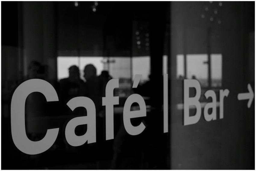 Elegant black and white photo of a café bar sign w