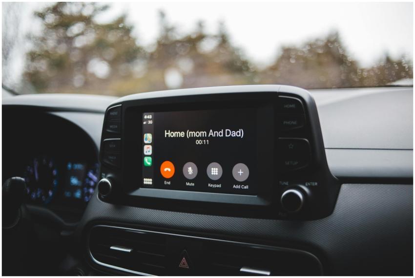 Screen of modern multimedia system in car with han