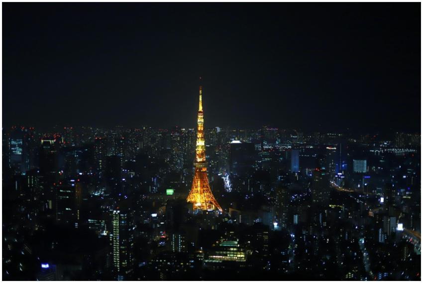 Stunning view of Tokyo Tower lit up, surrounded by