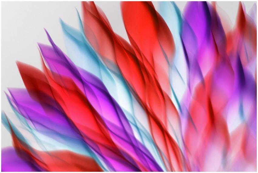 Dynamic abstract art with vibrant red, purple, and