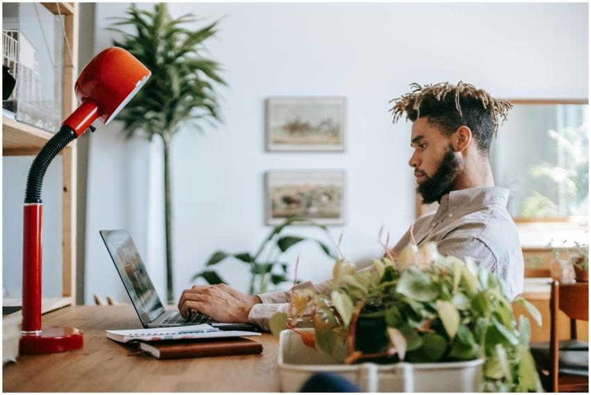 Side view of concentrated black guy in casual outf