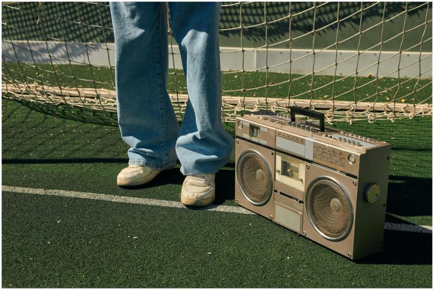 Classic boombox on a sportsground with retro style