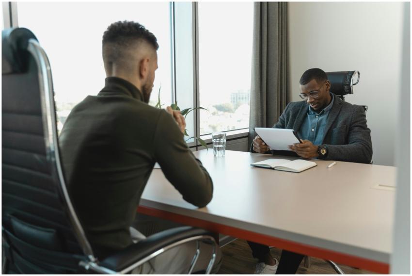 A job interview taking place in a modern office se