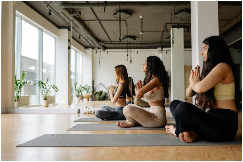 Group of women focused on meditation and yoga pose