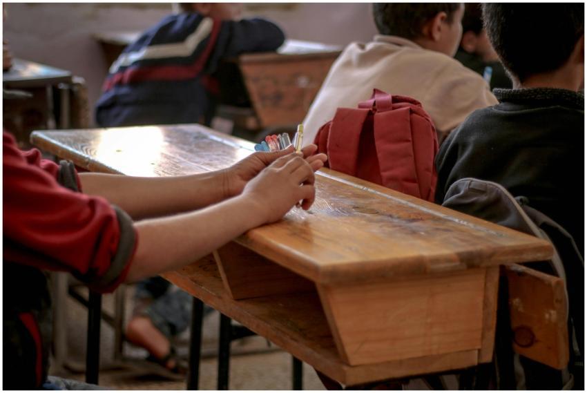 A focused view of students studying in a classroom