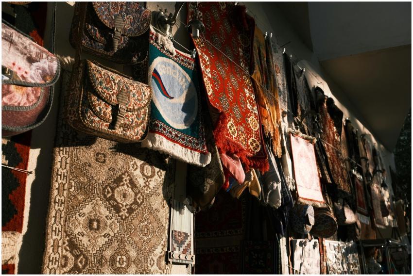 A vibrant array of traditional tapestries and bags