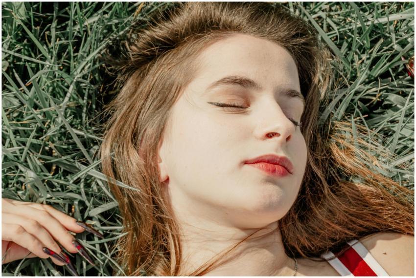 Young Woman Relaxing Sun