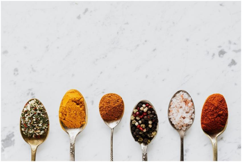 Top view of assorted aromatic condiments arranged