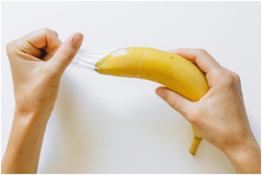 A conceptual image showing a banana with a condom
