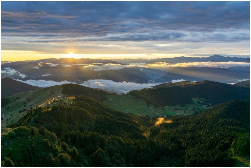 Capture the stunning sunrise over Monte Grappa in