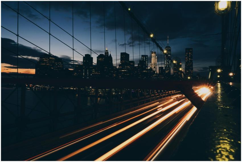 Stunning urban night scene with light trails on br