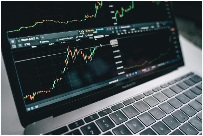 Close-up of a financial graph on a laptop screen,