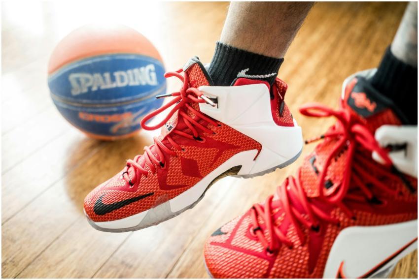 Close-up of red basketball sneakers in action with