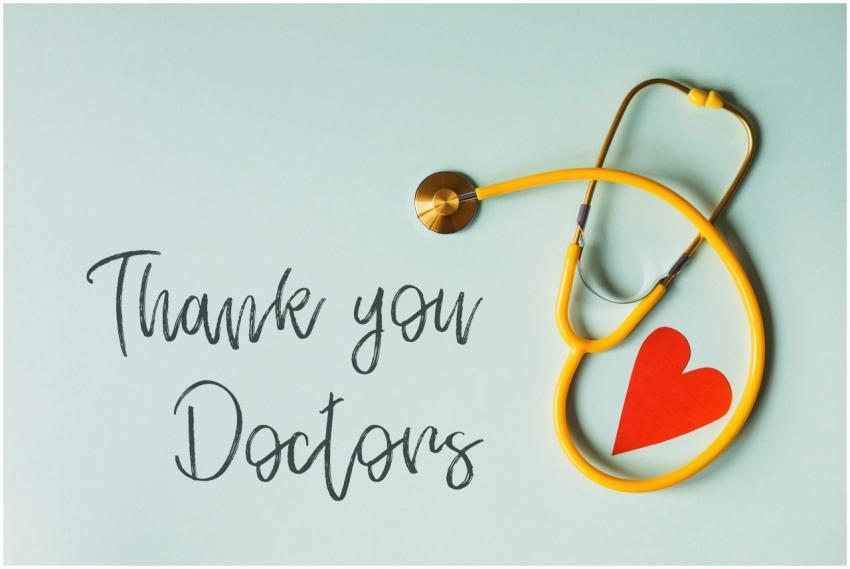 From above arrangement of yellow stethoscope with