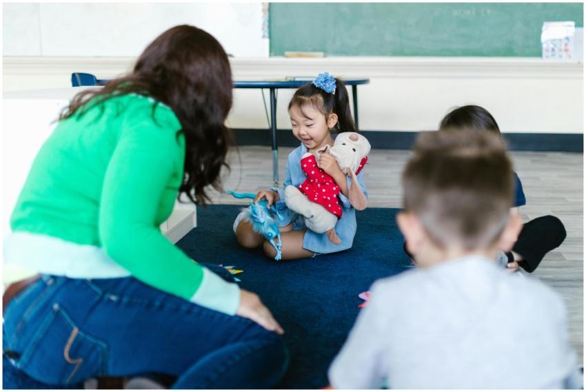 Group of children and a teacher engaged in a fun l