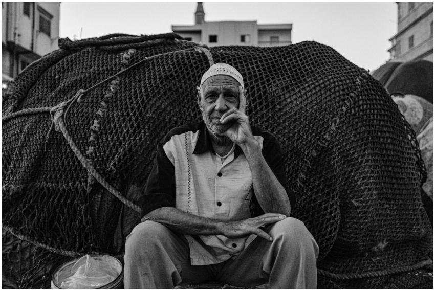 Black and white portrait of an elderly fisherman s