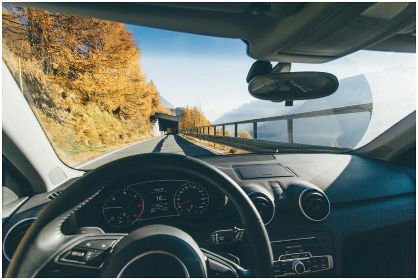 View from car interior driving through a scenic mo