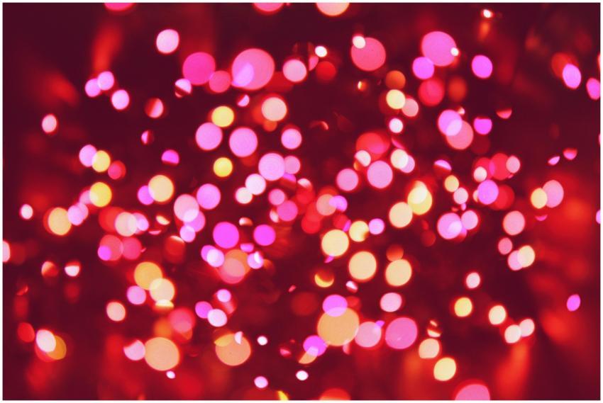 Colorful bokeh image featuring bright pink and ora