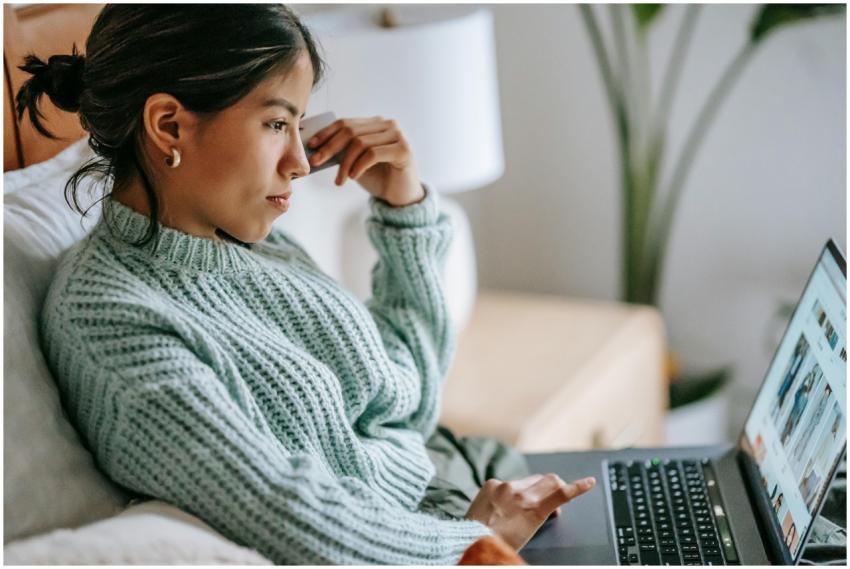 Side view of crop concentrated young ethnic female