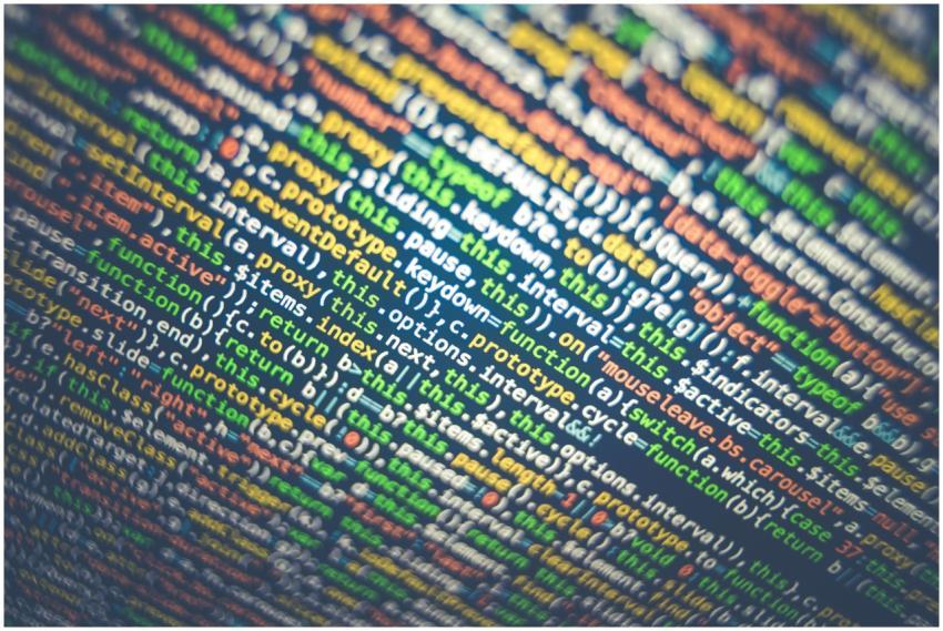 Vibrant multicolored source code displayed on a co