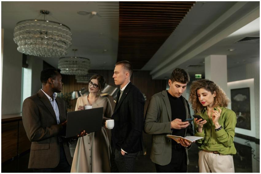 Group of professionals discussing work in a stylis